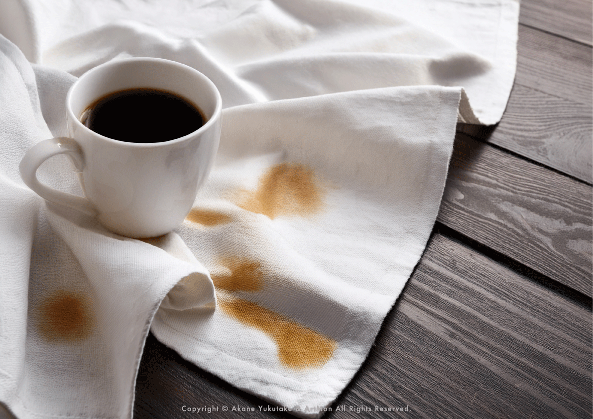 コーヒーのシミがついた布